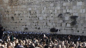 Holocaust survivor, 104, has 'emotional' birthday celebration at the Western Wall with 400 descendants