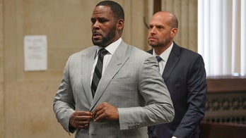 R. Kelly fails to appear for Chicago court date, prosecutors allege he 'refused transport'