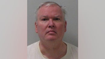 Michigan priest charged with binding boy in plastic, leaving him in closet