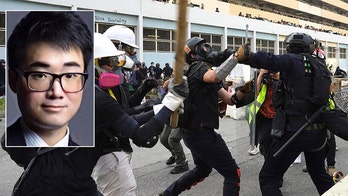 British Hong Kong consulate employee released from detention as pro-democracy protests turn violent