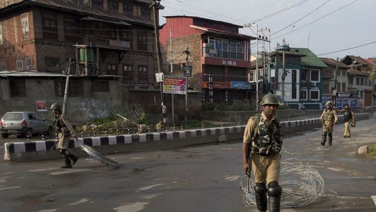 India forces arrest 500 in Kashmir as Pakistan suspends key train service to disputed region