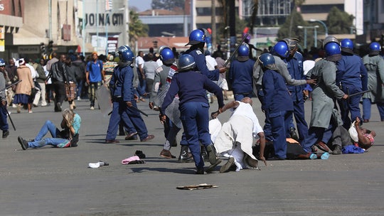 Zimbabwe protesters face tear gas, beatings from police during anti-government demonstrations