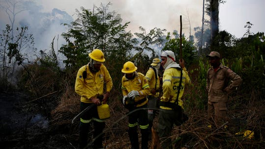 Brazil's Bolsonaro will consider $40M G-7 Amazon aid package - if Macron apologizes to him