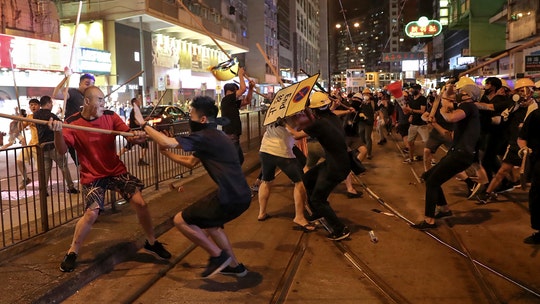 China warns Hong Kong protesters not to 'play with fire' as demonstrators 'prepared to die for the movement'