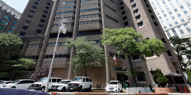 This July 1, 2019 photo shows the Metropolitan Correctional Center, in New York. Financier Jeffrey Epstein died by suicide while awaiting trial on sex-trafficking charges in New York, a former law enforcement official said Saturday. (AP Photo/Richard Drew)