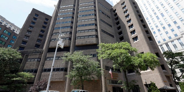 This July 1, 2019 photo shows the Metropolitan Correctional Center, in New York. Financier Jeffrey Epstein died by suicide while awaiting trial on sex-trafficking charges in New York, a former law enforcement official said Saturday. (AP Photo/Richard Drew)