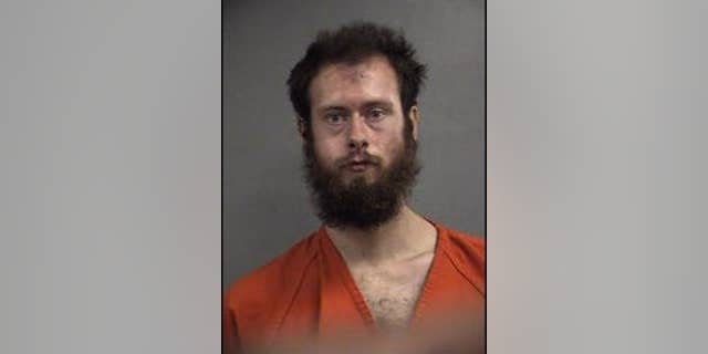 Cane Madden, 29, with a history of previous assault cases that were dismissed, is now accused of assaulting and raping an 8-year-old girl, authorities say. (Louisville Metro Police)