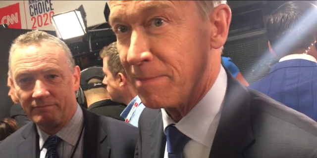 Democratic presidential candidate and former two-term Colorado Gov. John Hickenlooper speaks with Fox News in the spin room, following the second round of primary debates, in Detroit on July 30.