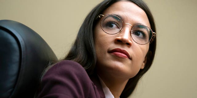 FILE - In this July 26, 2019 file photo, Rep. Alexandria Ocasio-Cortez, D-N.Y., attends a House Oversight Committee hearing on Capitol Hill in Washington. (AP Photo/J. Scott Applewhite)