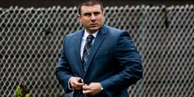 New York City Police Officer Daniel Pantaleo leaves his house Monday, May 13, 2019, in Staten Island, N.Y.