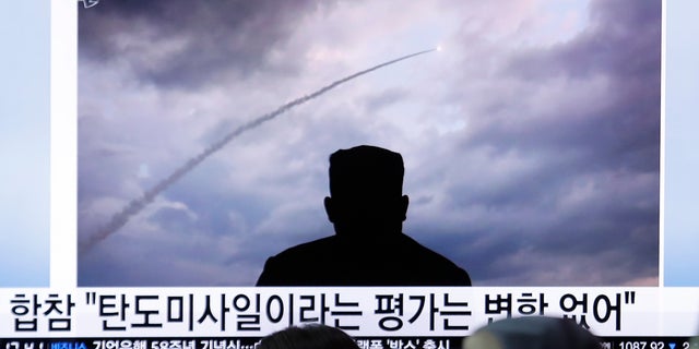 People watch a TV showing an image of North Korea's a multiple rocket launch during a news program at the Seoul Railway Station in Seoul, South Korea, Aug. 1, 2019. (Associated Press)