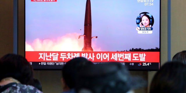 People watch a TV showing a file footage of a North Korea's missile launch during a news program at the Seoul Railway Station in Seoul, South Korea, Friday, Aug. 2, 2019. (Associated Press)