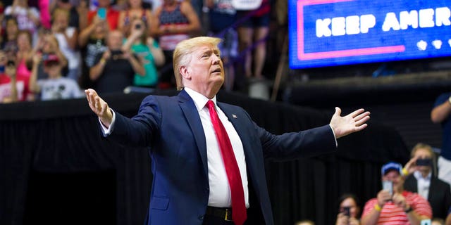 President Donald Trump arrives to speak at a campaign rally Thursday, Aug. 1, 2019, in Cincinnati. (AP Photo/Alex Brandon)