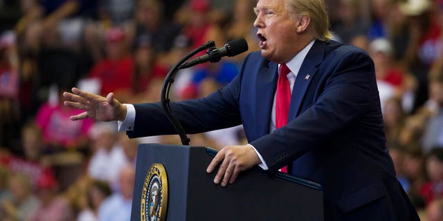 President Donald Trump speaks at a campaign rally Thursday, Aug. 1, 2019, in Cincinnati. (AP Photo/Alex Brandon)