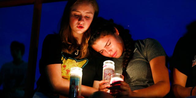 El Pasoans held a vigil in Texas after a mass shooting left at least 20 people dead, and another 26 injured.