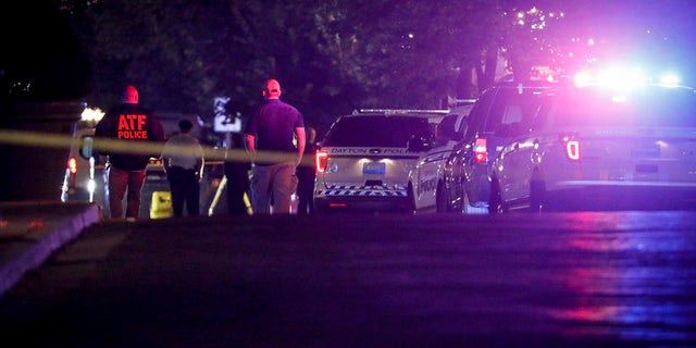 Authorities work at the scene of a mass shooting, Sunday, Aug. 4, 2019, in Dayton, Ohio. (Associated Press)