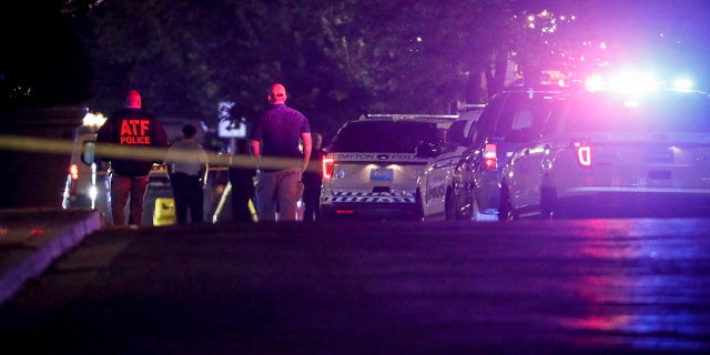 Authorities work at the scene of a mass shooting, Sunday, Aug. 4, 2019, in Dayton, Ohio. (Associated Press)