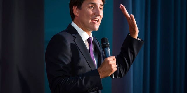 Canada's Prime Minister Justin Trudeau addresses supporters during a Liberal Party fundraiser in Surrey, British Columbia, Sunday, Aug. 4, 2019.