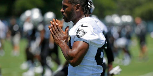 In this June 11, 2019, file photo, Oakland Raiders wide receiver Antonio Brown is shown during an NFL football minicamp in Alameda, Calif.