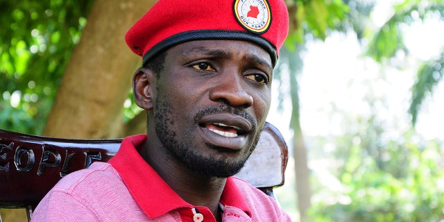 FILE- In this file photo of Monday July 15, 2019, pop star-turned-opposition lawmaker Bobi Wine, whose real name is Kyagulanyi Ssentamu, is seen while giving an interview to Associated Press at his home, Magere in Kampala, Uganda. (AP Photo/Ronald Kabuubi-File)