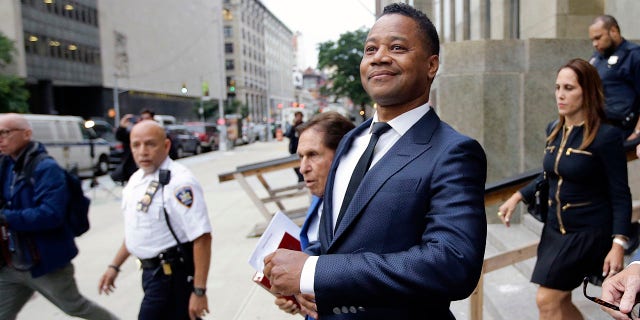FILE - In this June 13, 2019 file photo, Cuba Gooding Jr. leaves criminal court in New York. A New York City judge has rejected actor Cuba Gooding Jr.'s request to have his groping case thrown out. (AP Photo/Frank Franklin II, File)