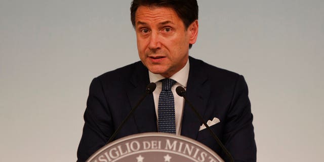 Italian premier Giuseppe Conte gives a press conference at Chigi Palace in Rome Thursday evening, Aug. 8, 2019. (AP Photo/Alberto Pellaschiar)