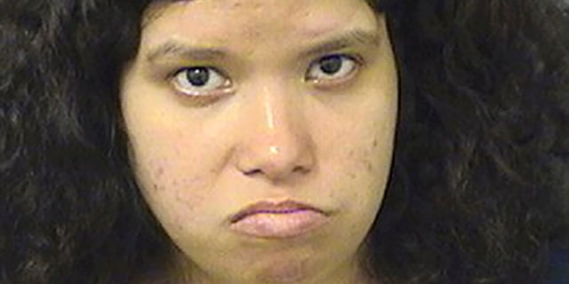 Miranda Perez is accused of threatening to carry out a shooting at an elementary school because her children were being moved there. (Palm Beach County Sheriff's Office via AP)