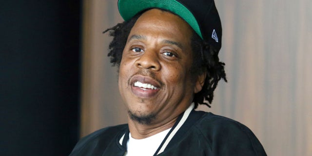 Jay-Z is suing an Australian children's bookstore for using his image and lyrics.
