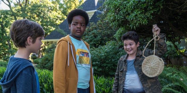 This image released by Universal Pictures shows Jacob Tremblay, from left to right, in the role of Max, Keith L. Williams in Lucas and Brady Noon as Thor in the film, 