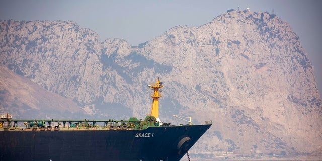 A view of the Grace 1 supertanker is seen backdropped by Gibraltar's Rock, as it stands at anchor in the British territory of Gibraltar, on Thursday.