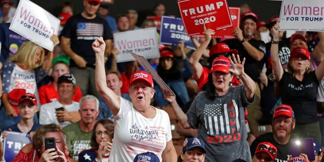 Supporters cheering at President Trump's campaign rally on Thursday.