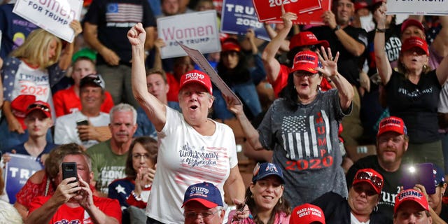 Supporters cheering at President Trump's campaign rally on Thursday.