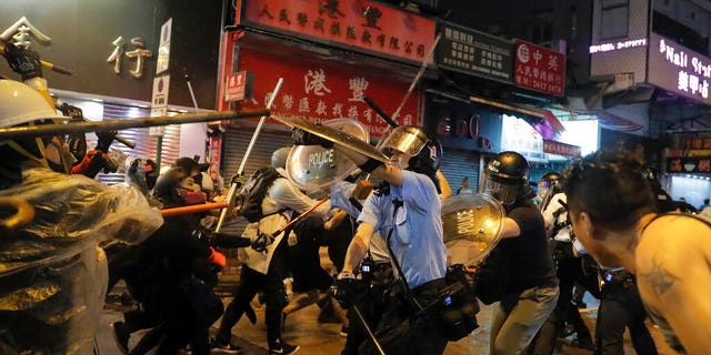 At least 21 police officers were injured Sunday during the pro-democracy protests, Mak Chin-ho, assistant police commissioner said.