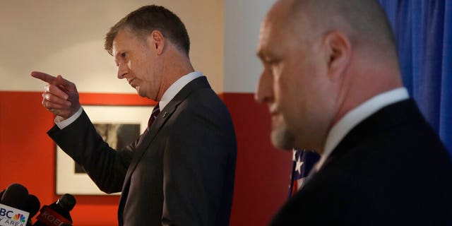 David L. Anderson, U.S. Attorney for the Northern District of California, left, and FBI Special Agent in Charge John F. Bennett at a news conference to announce charges against Levandowski in San Jose, Calif.