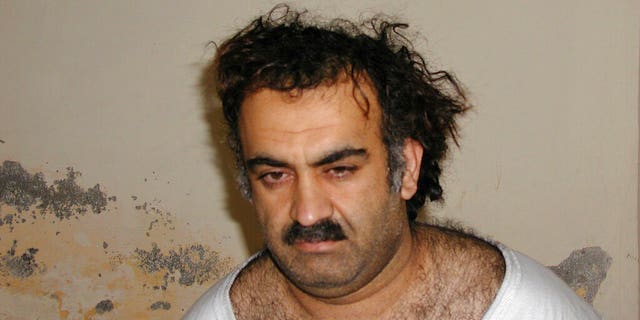 FILE - This Saturday March 1, 2003 photo obtained by The Associated Press shows Khalid Shaikh Mohammad, the alleged Sept. 11 mastermind, shortly after his capture during a raid in Pakistan. On Friday, Aug. 30, 2019, a military judge set Jan. 11, 2021 for the start of the long-stalled war crimes trial of the five men being held at the Guantanamo Bay prison on charges of planning and aiding the Sept. 11 terrorist attacks. (AP Photo)