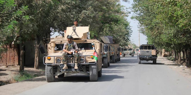 Afghan security forces arrive during a fight against Taliban fighters in Kunduz province north of Kabul, Afghanistan, Saturday, Aug. 31, 2019. The Taliban have launched a new large-scale attack on one of Afghanistan's main cities, Kunduz, and taken hospital patients as hostages, the government said Saturday, even as the insurgent group continued negotiations with the United States on ending America's longest war. (AP Photo/Bashir Khan Safi)