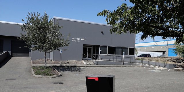 On Wednesday, July 31, 2019, photo of a building that once housed offices and storage space for a pawnshop alleged to have served as a facade to a network of thieves is empty in Kent, Wash. 