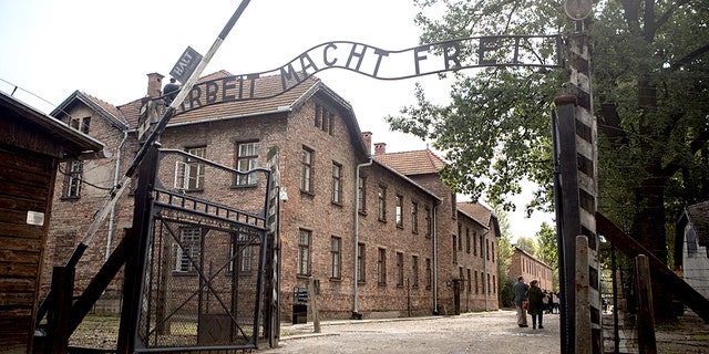Arbeit macht frei (work sets you free) slogan on the entrance of Auschwitz concentration camp, the biggest extermination camp in Europe built by the Nazis during World War II. (iStock)