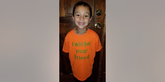 Six-year-old Blake Rajahn, pictured, wearing his internet-famous shirt.