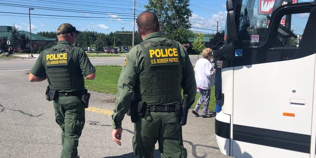 U.S. Customs and Border Protection agents conduct an immigration check. A six-month-old child is in critical condition at a Texas hospital after she was found by U.S. Border Agents along with her father and 21 others trying to make it across the Rio Grande into the United States