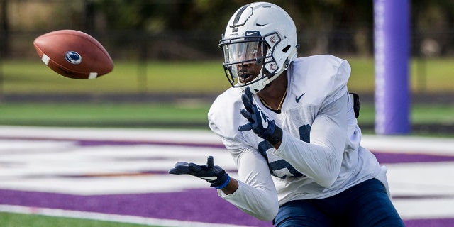 FILE - In this Dec. 29, 2018, file photo, Penn State wide receiver Juwan Johnson hauls in a pass during practice for the Citrus Bowl NCAA college football game in Orlando, Fla. (Joe Hermitt/The Patriot-News via AP, File)