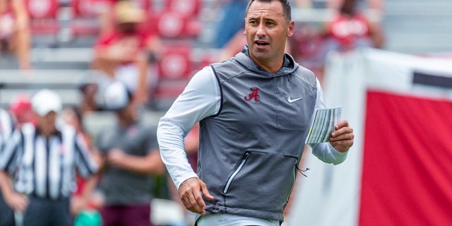 Alabama offensive coordinator Steve Sarkisian works his payers through drills during an NCAA college fall camp fan-day college football scrimmage, Saturday, Aug. 3, 2019, at Bryant-Denny Stadium in Tuscaloosa, Ala. (AP Photo/Vasha Hunt)