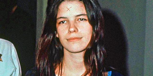 This March 29, 1971, file photo shows Leslie Van Houten in a Los Angeles lockup. She didn't take part in the Tate killings but accompanied Charles Manson and others to the LaBianca home the next night where she held Rosemary LaBianca down with a pillowcase over her head as she and others stabbed her dozens of times.