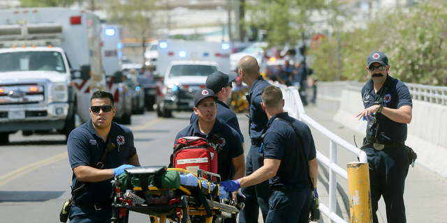 El Paso Fire Medical personnel arrive at the scene of a shooting at a Walmart near the Cielo Vista Mall in El Paso, Texas, on Aug. 3, 2019.  (Mark Lambie/The El Paso Times via AP, File)