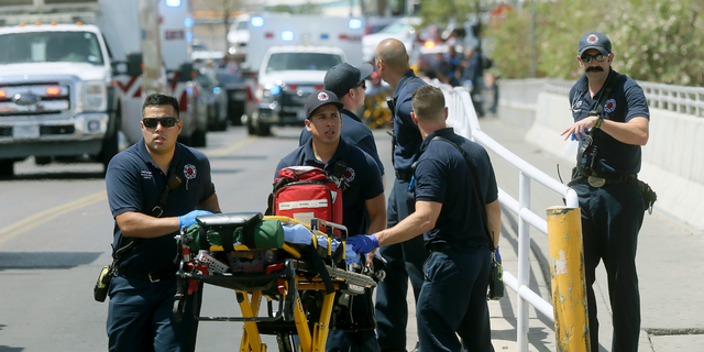 El Paso Fire Medical personnel arrive at the scene of a shooting at a Walmart near the Cielo Vista Mall in El Paso, Texas, on Aug. 3, 2019. (Mark Lambie/The El Paso Times via AP, File)