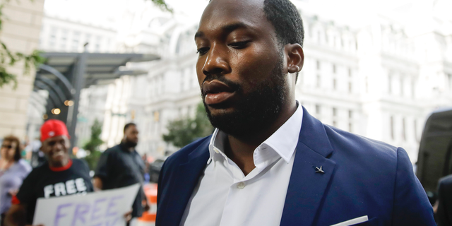 Rapper Meek Mill arrives at the criminal justice center in Philadelphia for a status hearing, Tuesday, Aug. 6, 2019. (AP Photo/Matt Rourke)