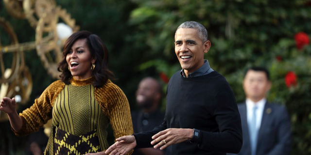 Oct. 31, 2016: The Obamas dance with kids to the beat of "Thriller" during a Halloween celebration at the South Portico of the White House in Washington. (AP Photo/Manuel Balce Ceneta)