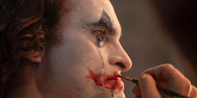 This image released by Warner Bros. Pictures shows Joaquin Phoenix in a scene from "Joker," in theaters on Friday. (Niko Tavernise/Warner Bros. Pictures via AP)