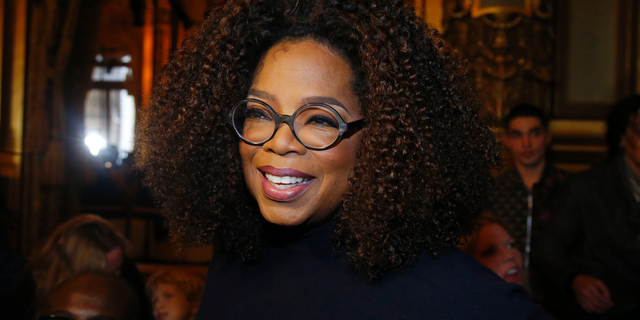 Oprah Winfrey at the presentation of Stella McCartney's ready-to-wear Fall-Winter 2019-2020 fashion collection in Paris on March 4, 2019 (AP Photo/Michel Euler, File)
