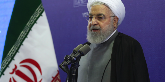 In this photo released by the official website of the office of the Iranian Presidency, President Hassan Rouhani speaks in the inauguration ceremony of a power plant in northwestern Iran, Thursday, Aug. 1, 2019. Rouhani said U.S. financial sanctions on Iran's foreign minister are "childish" and a barrier to diplomacy. (Iranian Presidency Office via AP)